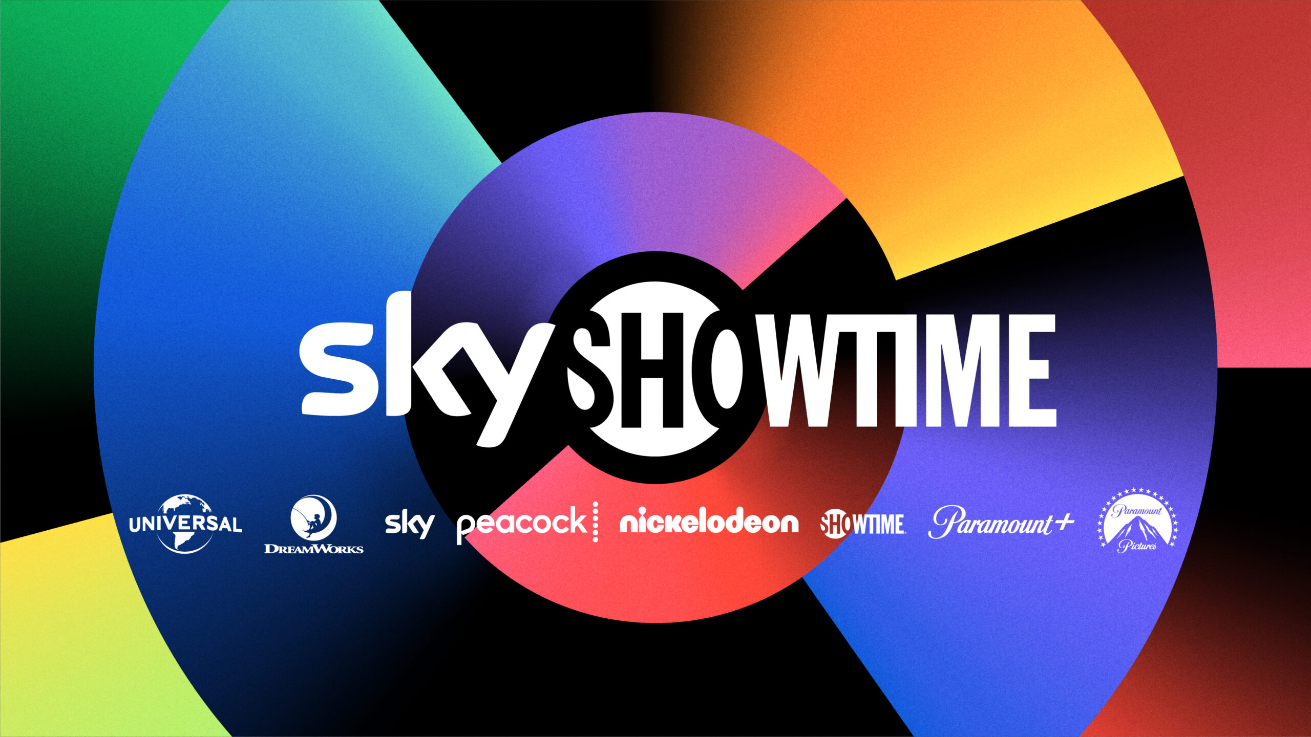 The image shows a colorful graphic with the logo for "SkyShowtime" in the center against a background of segmented colors. Surrounding the central logo are various media brand logos: Universal, DreamWorks, Sky, Peacock, Nickelodeon, Showtime, Paramount+, and Paramount Pictures.